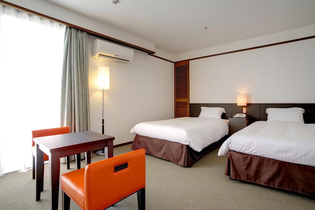 Hotel City Court Naha Rom bilde