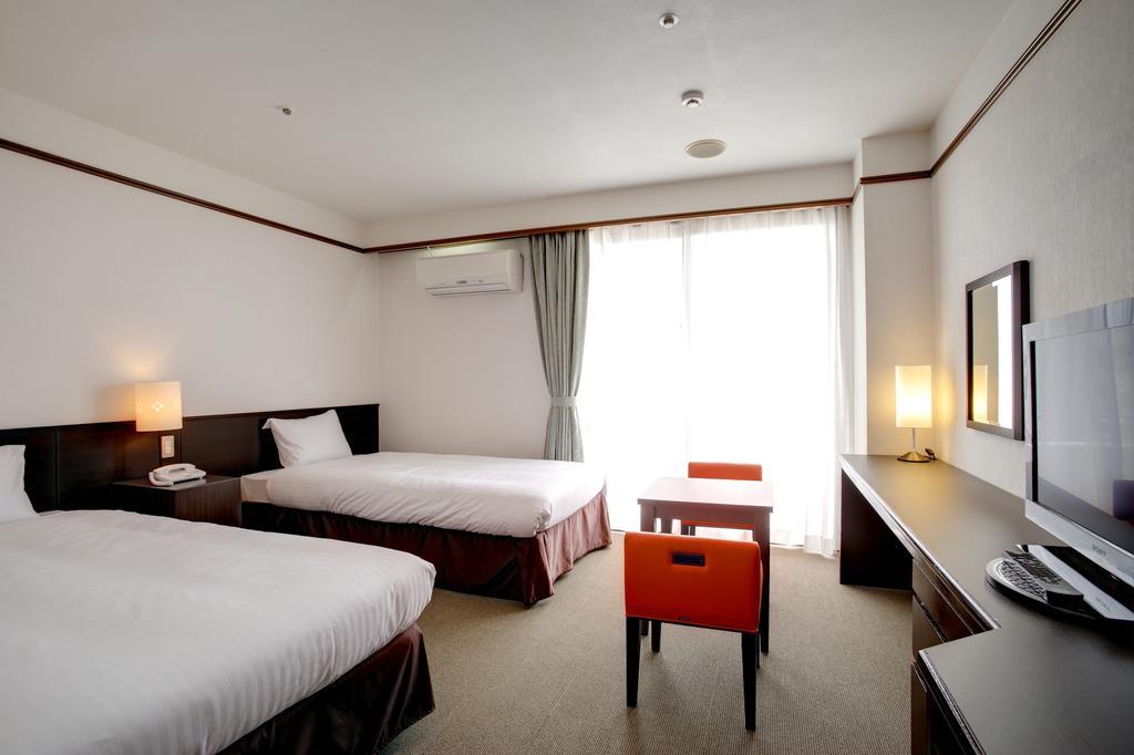 Hotel City Court Naha Rom bilde