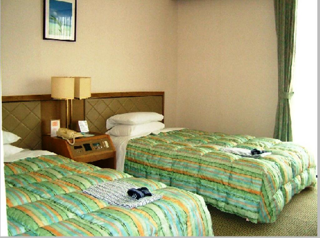 Hotel City Court Naha Rom bilde