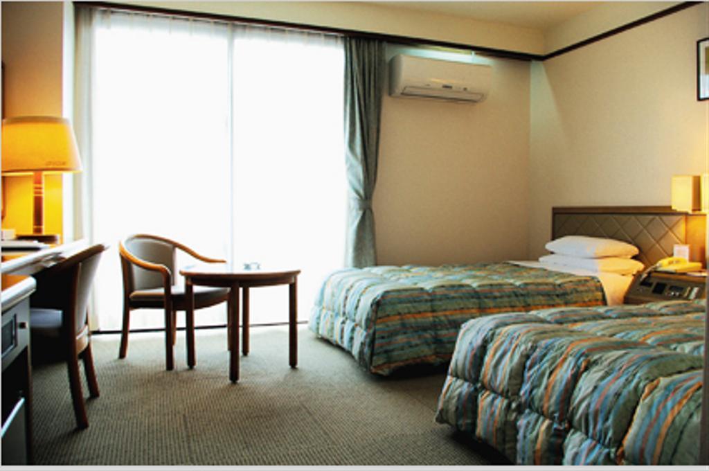 Hotel City Court Naha Rom bilde